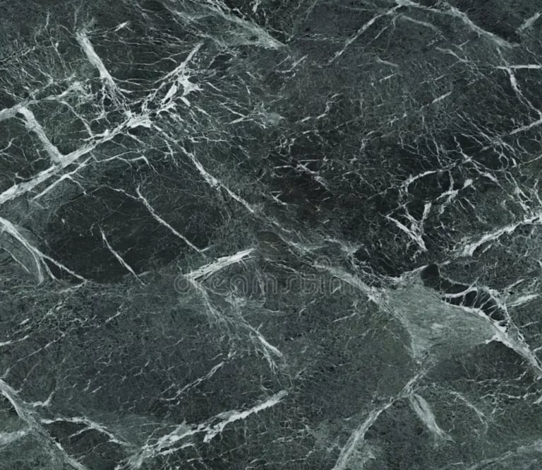 Close-up of dark green marble surface with white and light gray veining patterns